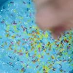 children playing with colorful materials